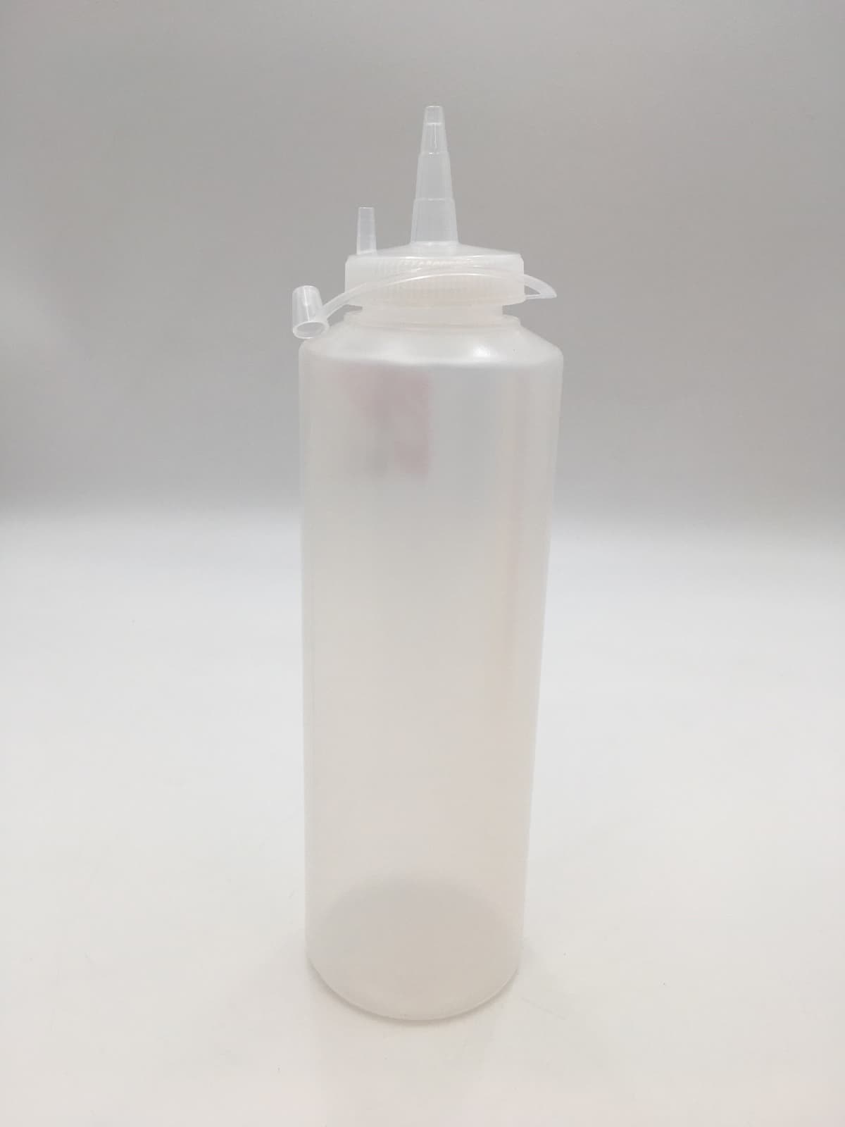 Диспенсер для соусів 500 мл. (прозорий) GPSC--00500 Gastro Plast PE Прозорий, з ковпачком - зображення 1